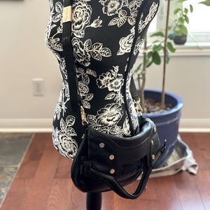 Foley & Corinna Genuine Leather Handle and crossbody bag.